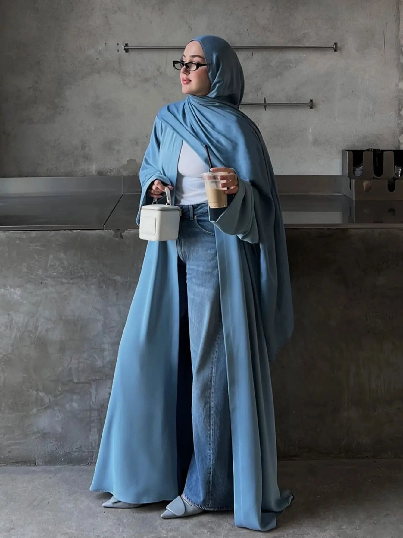 Elegant Women's Long Abaya in a beautiful hue, featuring a comfortable Woven Fabric with Regular Long Sleeves and a slight stret