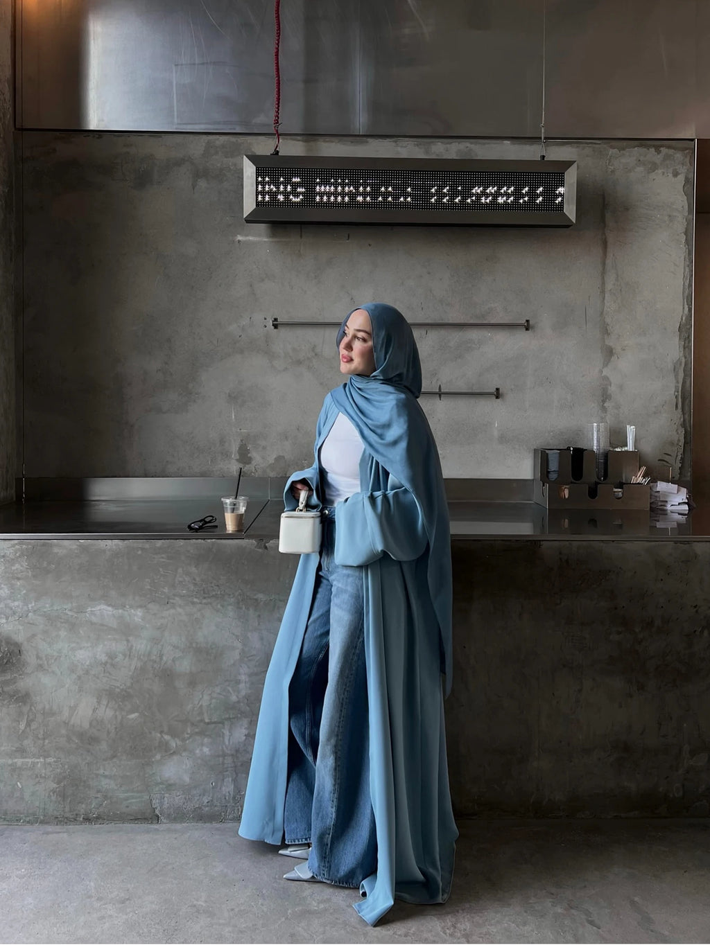 Elegant Women's Long Abaya in a beautiful hue, featuring a comfortable Woven Fabric with Regular Long Sleeves and a slight stret