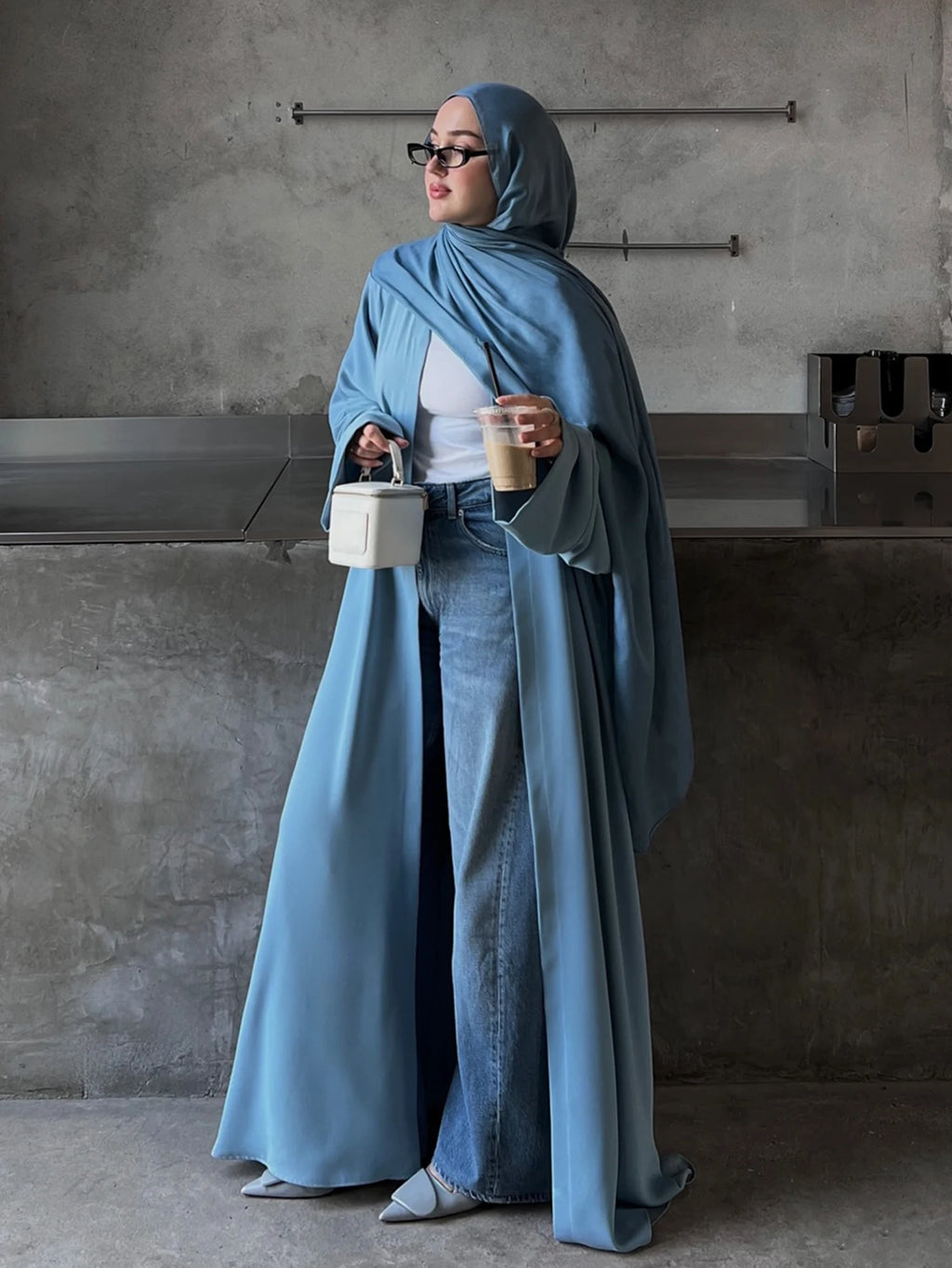 Elegant Women's Long Abaya in a beautiful hue, featuring a comfortable Woven Fabric with Regular Long Sleeves and a slight stret